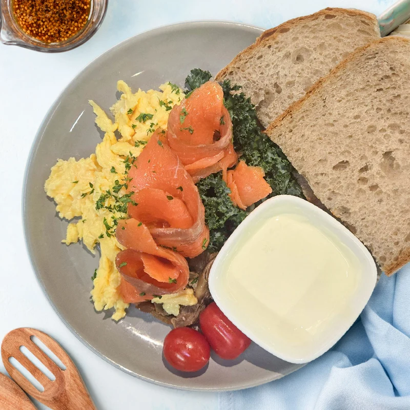Scrambled Eggs w/ Nowergian Smoked Salmon And Wholewheaet Bread