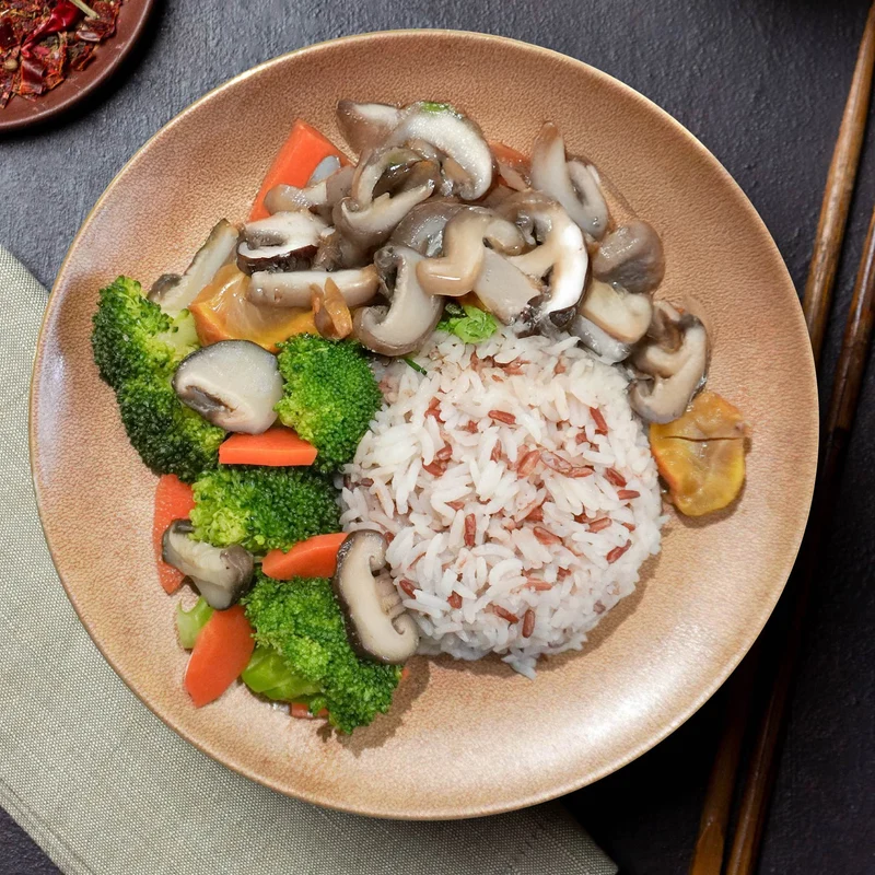 C. Healthy Chinese Four Treasure Mushrooms W/ Stir Fried Vegetables And Jasmine Rice