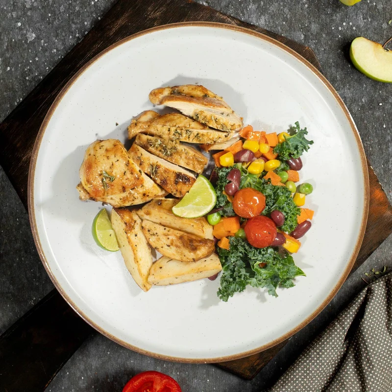 A. Grilled Garlic Lemon Thyme Chicken W/ Seasonal Greens And Potato
