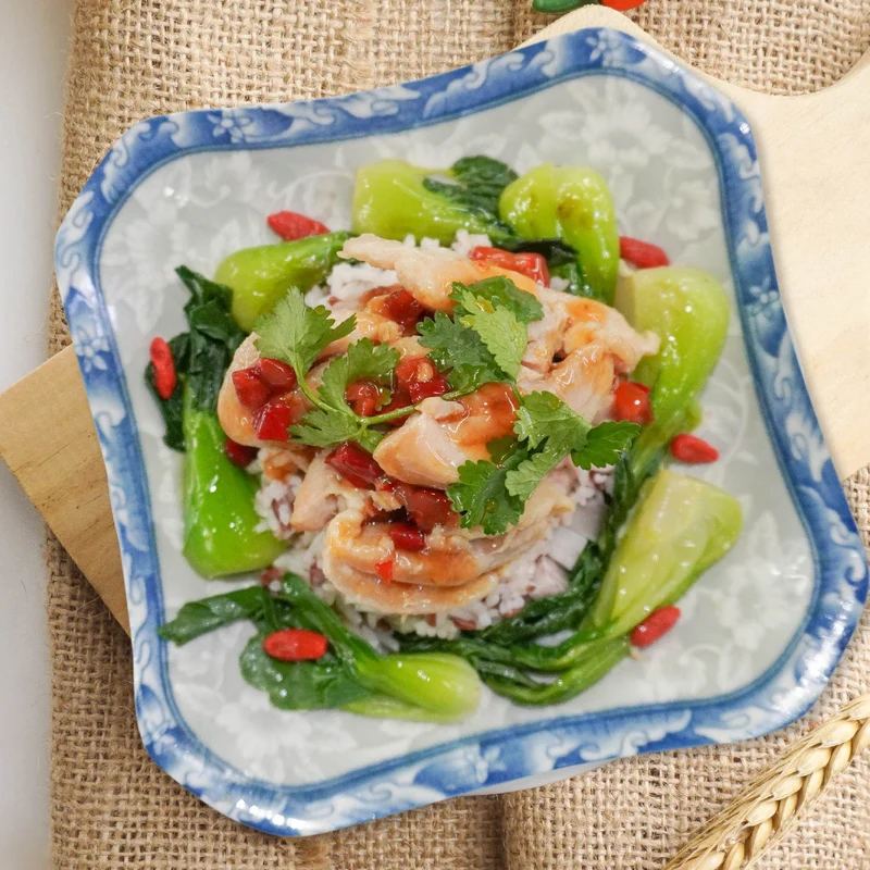 C. Chinese Style Chicken Claypot W/ Seasonal Vegetables And Taro Mix Rice