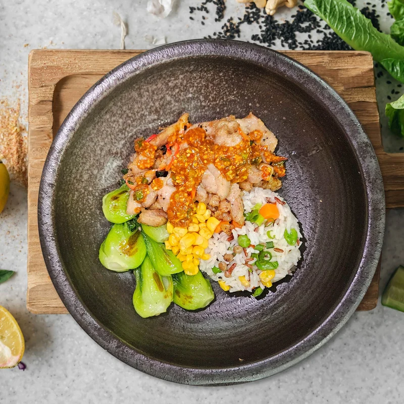 B. Indonesian Nasi Goreng Chicken W/ Sautee Vegetables And Healthy Fried Rice