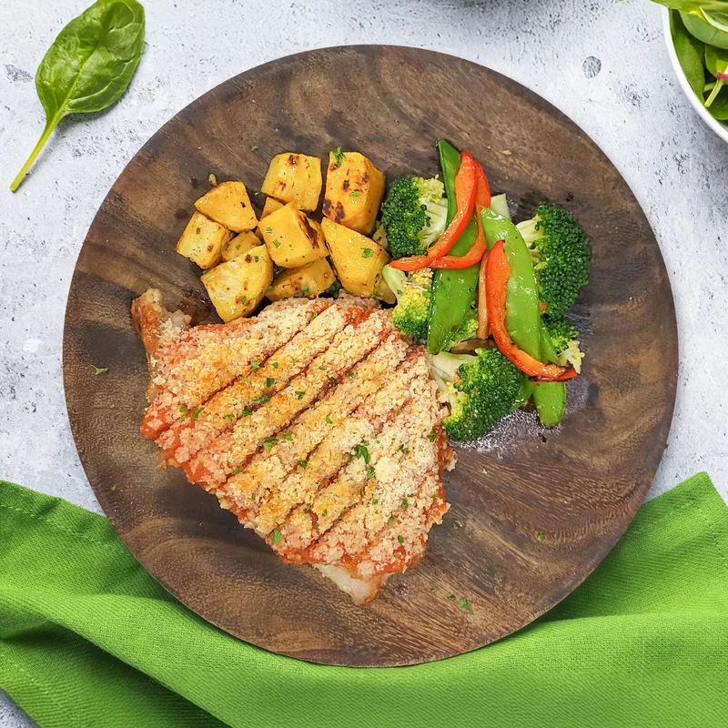 A. Healthy Pork Schnitzel Served W/ Roast Vegetables, Sweet Potato And Lemon Garlic Aioli