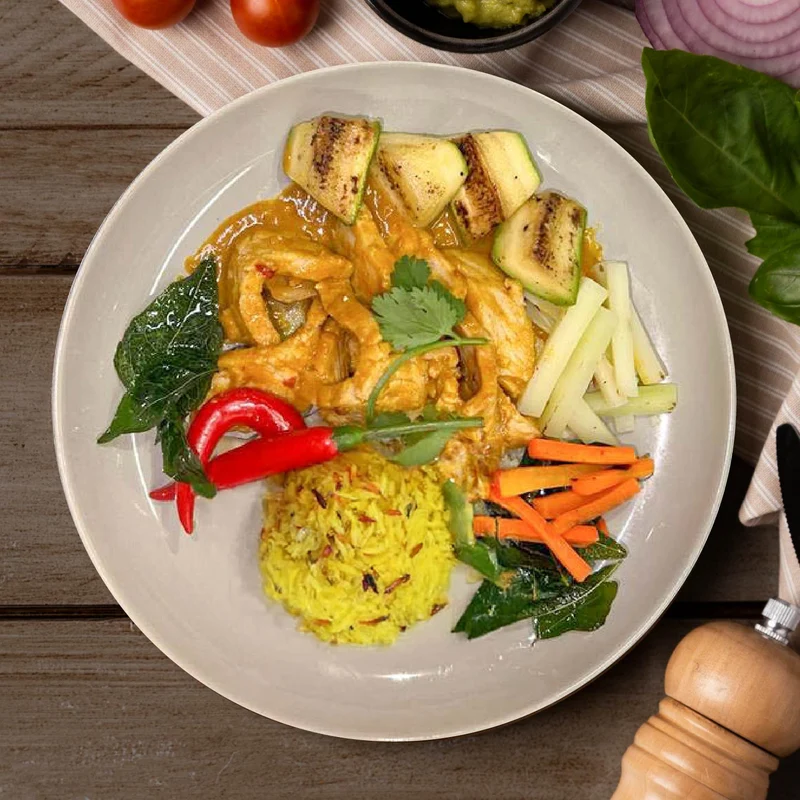 B. Low Fat Pork Rogan Josh W/ Seasonal Vegetables And Turmeric Rice