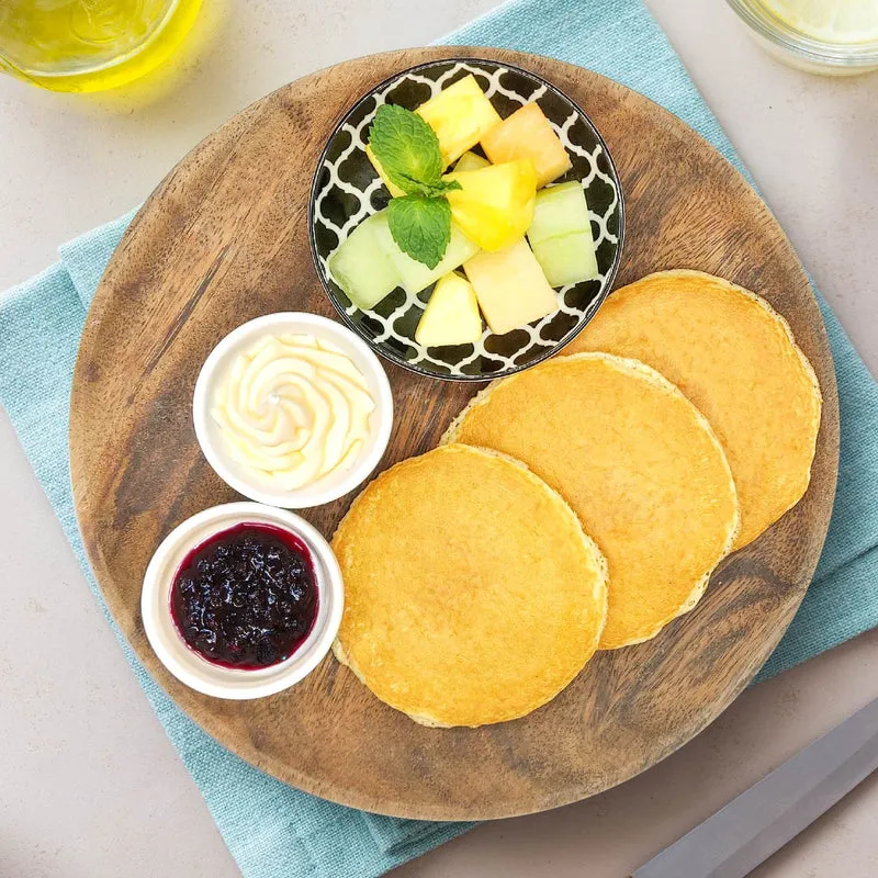 High Protein Pancakes W/ Blueberry Jam, Vanilla Cream And Fresh Fruit Salad