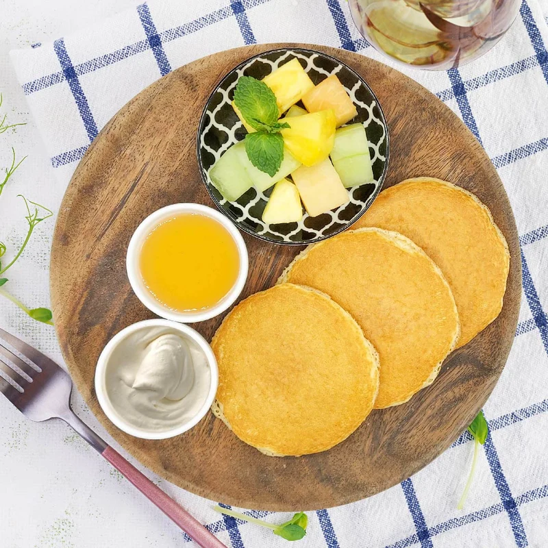 Quinoa Pancakes W/ Maple Syrup, Vanilla Cream and Fruit Salad