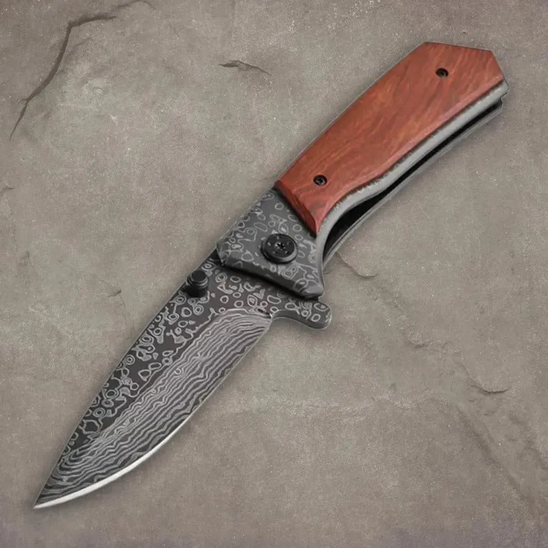 Jagdmesser mit Gravur in Damaszeneroptik