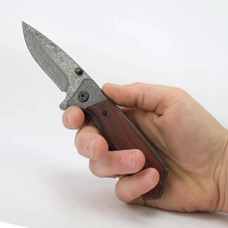 Jagdmesser mit Gravur in Damaszeneroptik